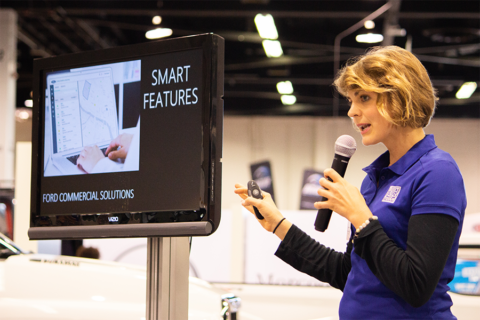 Client discussions at Oakio booth