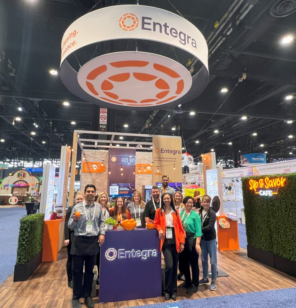 company picture of team at a trade show booth
