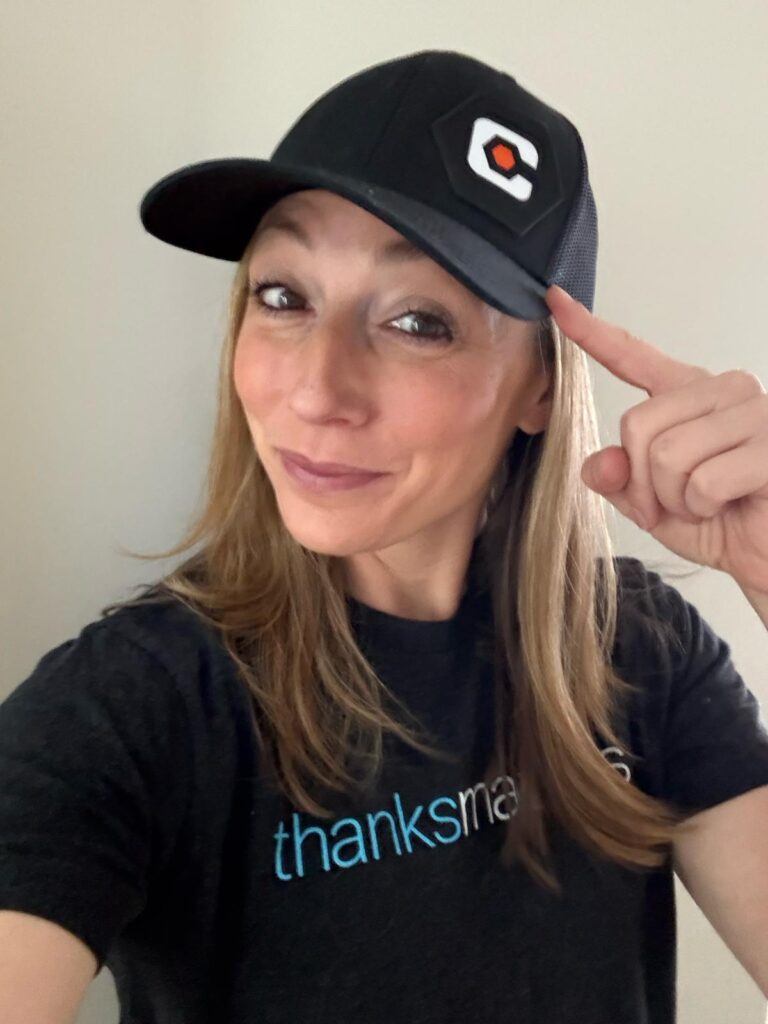 woman wearing branded hat